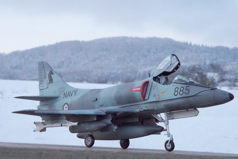 McDonnell Douglas A-4G No. 885 in front of the snowy Maurice Mountain